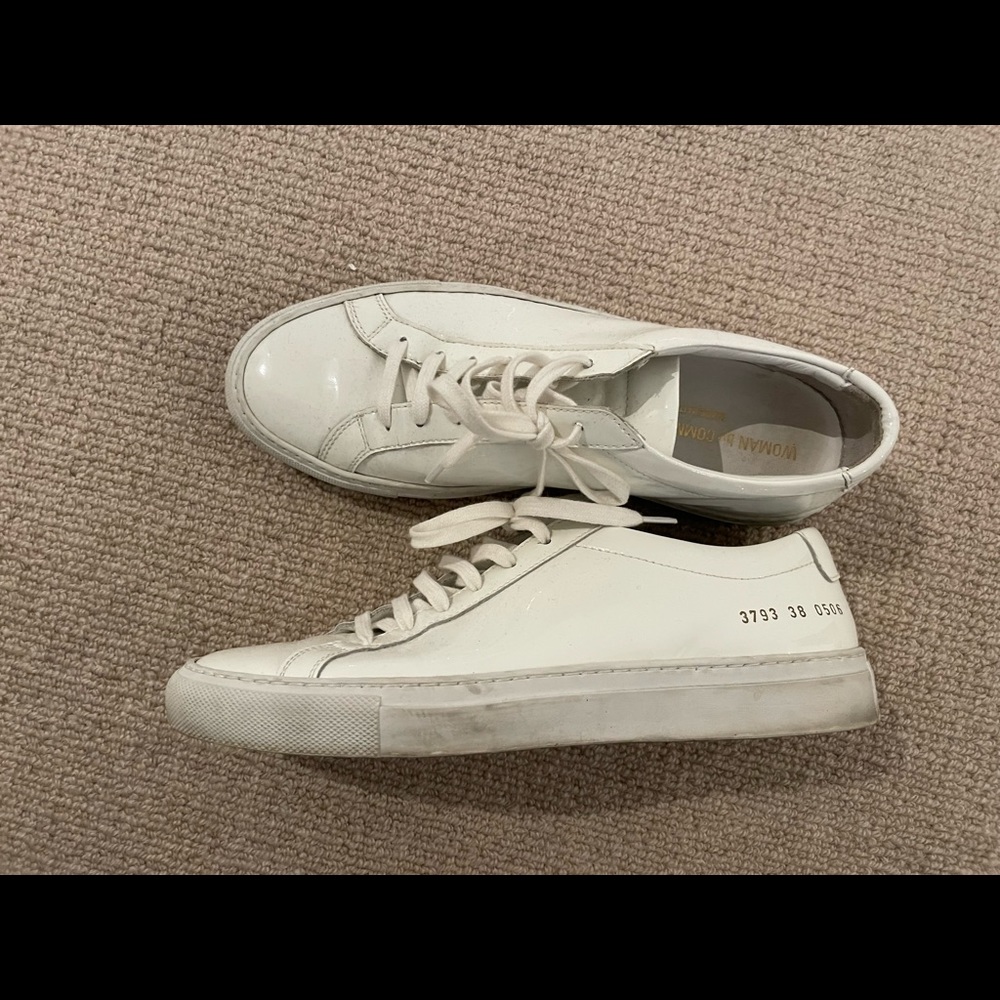 Common Projects
Women's White Achilles Low-top Patent Leather Sneakers